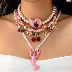 Dopamine Cherry Charm Necklace for Women, Pink Pearl Ribbon Pendant Jewelry with Coastal Lobster Charm, Coquette Y2K Summer Accessory for Vacation Outfits, Beach Trips & Everyday Layering Looks