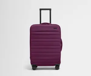 The Softside Bigger Carry-On in Plum Purple