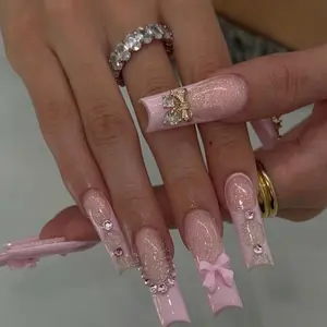 Pink Glitter Acrylic Nails with Rhinestone Bow Design for Women's Fashionable Manicure - Elegant & Sparkling Nail Art