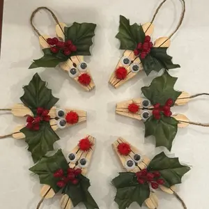 Handmade Christmas Reindeer Ornaments with Holly Leaves and Red Berries Wooden Craft Decorations