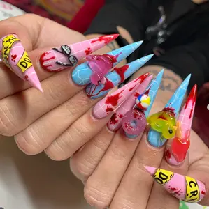 summer horror stiletto nails with 3d duck, donut, popsicle, bikini and glasses on pink blue grid tips splattered in red for a creepy pool party vibe