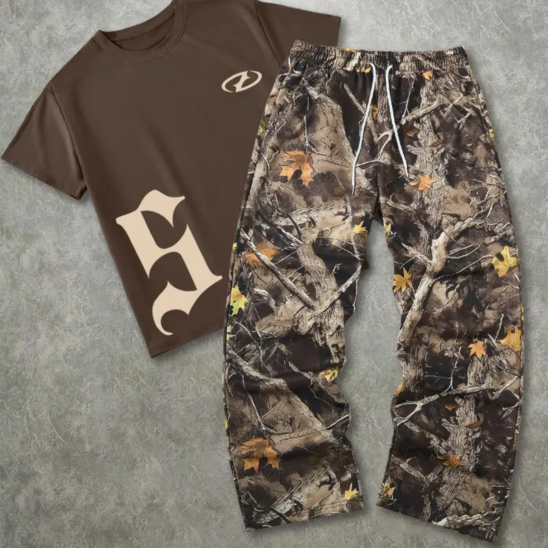 Men's Fashion Street Casual Vintage Camo 2-Piece Set Outfit, Letter Print Short Sleeve T-Shirt & Leaf Camo Wide Leg Pants, Loose Fit Outdoor Adventure Camouflage Apparel, Menswear