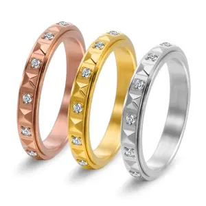 Women's Narrow Titanium Steel Spinner Ring with Pyramid-Set Diamonds pure copper adjustable magnet bracelet