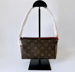 Pre-owned Louis Vuitton leather Shoulder Bags Recital Shoulder Bag Classic Monogram Design, Brown & Gold Tones