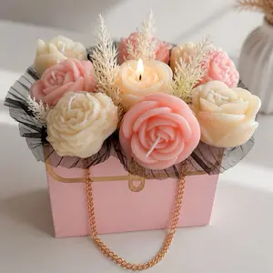 Elegant Rose Candle Arrangement in Pink Box with Gold Chain Handle Perfect for Home Decor and Gifts