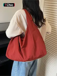 Large capacity casual versatile hobo shoulder bag, solid color lazy style, niche design, underarm bag, personalized trend, western-style handbag, short distance travel, outdoor commuting, sports bag