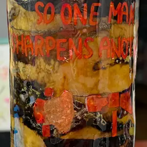 Ink Dyed Tumbler with So One Man Sharpen's Anot Text and Colorful Design Elements