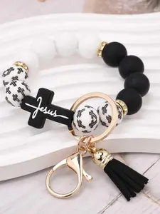 One handmade, stylish, cute leopard print tassel cross beaded keychain/bag charm. Free your hands and make a great gift or fashion accessory for friends.