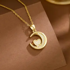 Gold Tone Cable Chain Necklace with Crescent Moon Charm and Pink Star Charm Pendant