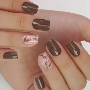CurvLife Mocha Luxe Press On Nails – Elegant short round nails in deep coffee brown with accent marble art and delicate gold foil details, offering a chic and timeless look that’s easy to apply, strong, reusable and perfect for both everyday wear