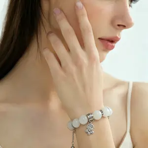 Ladies' natural 14mm white ghost bracelet, paired with a Four Seasons Ghost Magic Box, vintage silver flower sun pendant accessory, spiritual healing meditation protective crystal jewelry,
