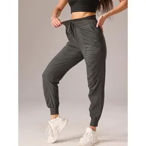 Women's Quick-Dry Athletic Joggers with Drawstring Waist and Side Pockets - Slimming Pleated Design, Breathable Polyester Blend for Running & Fitness