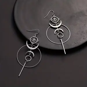 A pair of retro punk style moon demon eye earrings, exaggerated jewelry gifts are suitable for men and women