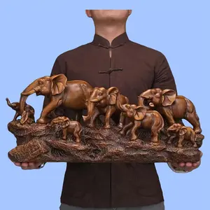 A Decorative Elephant Figurine Symbolizing Good Fortune, a Wealth-Attracting Ornament, a Craft Item for Entryway Decor, Suitable As a Gift for Housewarming Or for Display in The Living Room, Office, Or on a TV Cabinet. Brown Resin