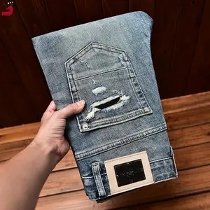 2025 personality Street jeans men's fall slim fit skinny fashion fashion ripped patch scrape denim trousers