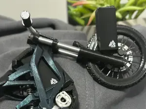 Mini 3D Printed Surron with Fully Working Suspension Compact Design Versatile Use Easy to Carry Functional Accessory