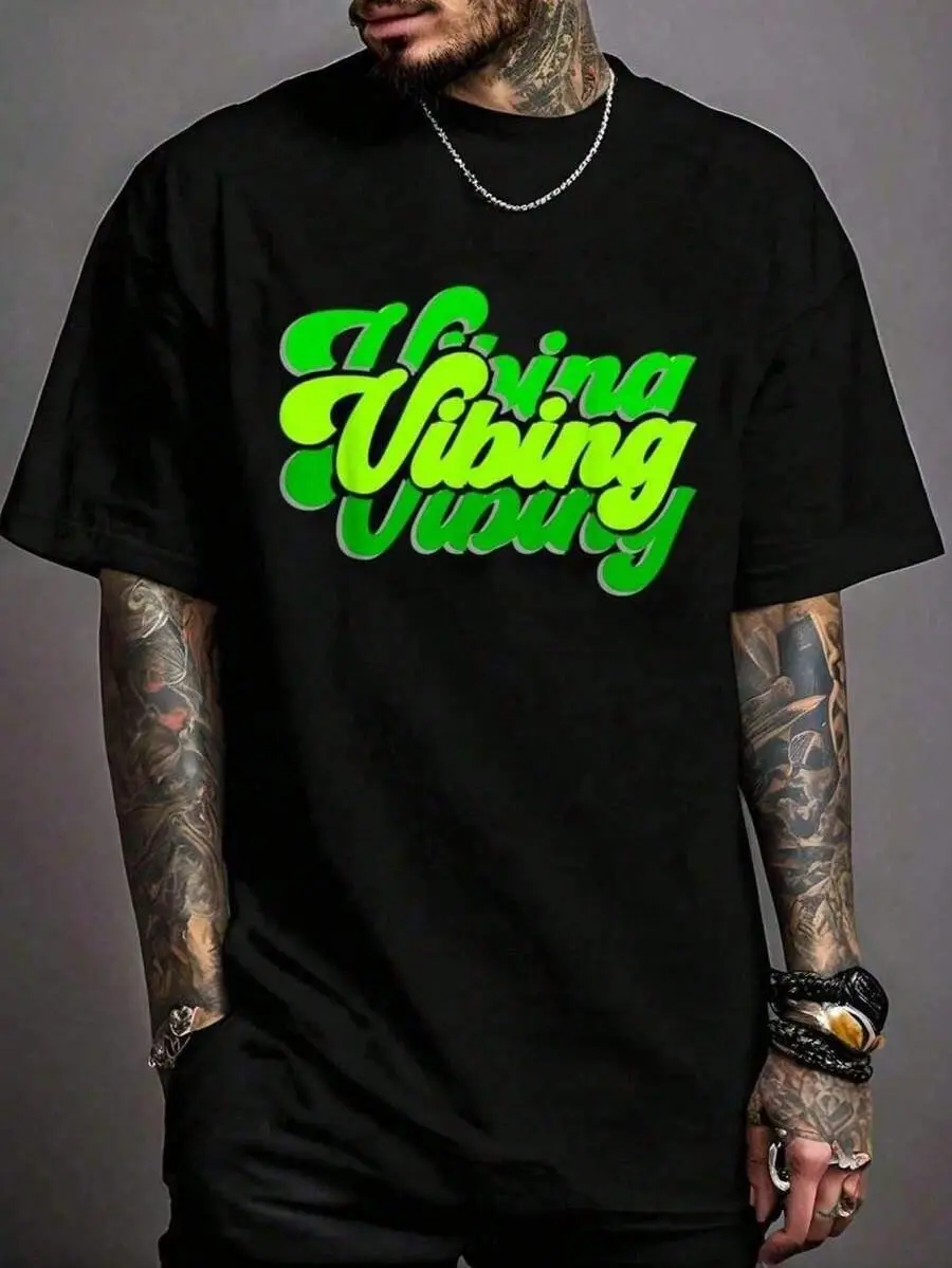 Summer ClothesMen Green Vibe Graphic T-Shirt Neon Green Print On Black A Bold Statement Perfect For Everyday Wear And Parties Vibrant Lime Green Lettering Formal Fit Men Stylish Top With Green Vibe Graphic Comfortable Fit Crew Neck Short Sleeves For