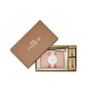 COACH Classic Monogram L-Shaped Zipper Wristlet Handbag in Pink for Women