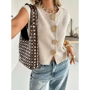 Elegant women’s knitted cardigan with buttons, sleeveless round neck design, unique animal-shaped details, creating a fashionable autumn look GARMENTARY