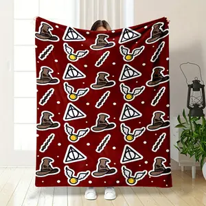 Harry Potter Themed Throw Blanket, Featuring Iconic Elements Like the Sorting Hat, Elder Wand, Deathly Hallows Symbol, and Golden Snitch. The Deep Red Background with White Dots Adds a Cozy Vibe