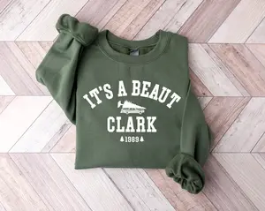 It's a Beaut Clark Christmas Sweatshirt Funny Holiday Crewneck Ugly Christmas Sweater National Lampoon Inspired Unisex Winter Outfit Gift for Him Her Fabric Fitted