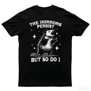 The Horrors Persist But So Do I" Opossum Unisex Funny Meme Graphic T-Shirt for Resilience,t shirts for men,t shirts for women,funny t shirt,graphic t shirts,men's t shirts,good graphic tees,funny graphic tee,trendy t-shirts,graphic tees,custom t