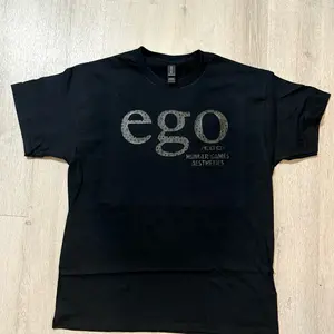 EGO Black Tee - Women's Short Sleeve Top with Graphic Text Design - Womenswear
