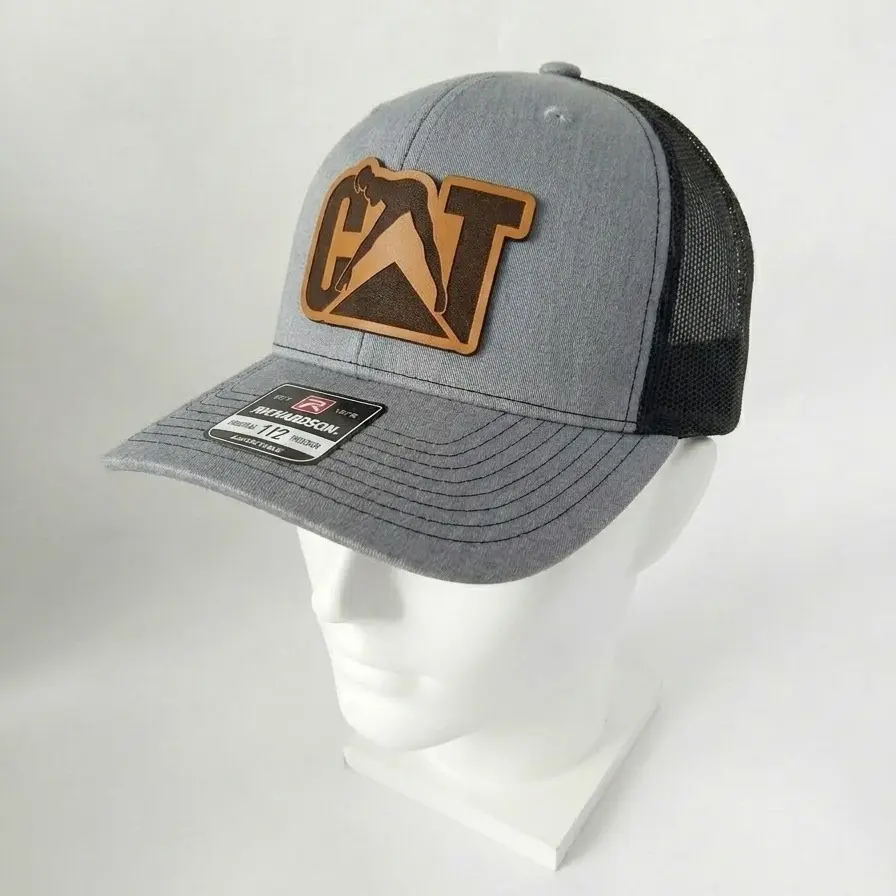 Naughty Chick Leather Patch Trucker Hat - Premium Richardson 112 Style Cap - Unique Graphic Headwear for C.A.T and Construction Enthusiasts - Durable Adjustable Snapback - High Quality Laser Engraved Patch Gift for Men