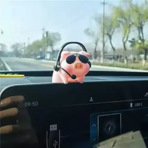 An adorable pig-shaped dashboard ornament for cars, used as automotive decoration — a high-quality flocked cartoon pig.
