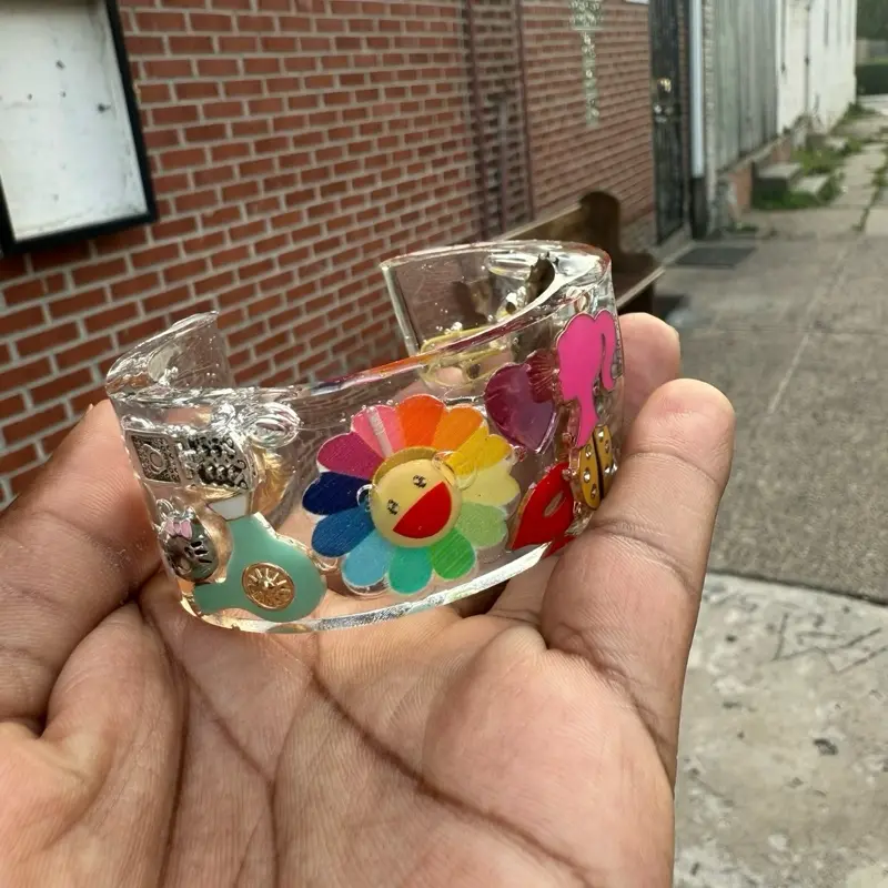The Junk Bangled Bracelet with Colorful Flower and Heart Charms for Stylish Accessory