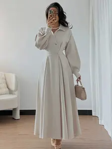 A women's fashionable light apricot color waist cinched shirt style dress with a collar design that highlights the waistline, suitable for commuting to work, shopping, and outdoor wear Maxidresses