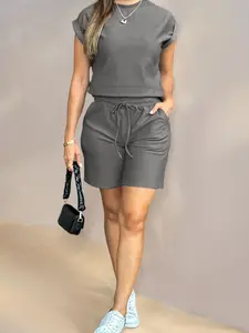 Women Casual Daily Commute Outfits 2 Piece Shorts Set, Summer Textured Short Sleeve & Shorts Matching Set With Side Pockets, Elastic Waist Stretchy Fabric, Essential Summer Clothes For Ladies