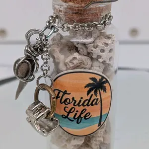 Handcrafted Florida Before Us genuine authentic one of a kind coral filled trinket bottle ornament featuring a wire wrapped shark tooth by ToothRaiders