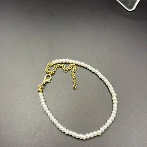 White Beaded Bracelet with Gold Chain - Simple Design, Elegant Style
