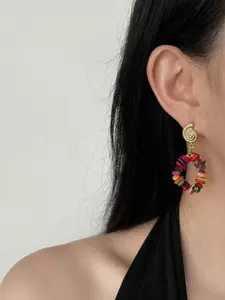 A pair of vintage-style, handcrafted, colorful natural stone hoop earrings; bold, statement-making colorful gemstone earrings for women