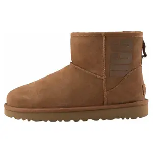 UGG Classic Mini Women's Suede Rubber Logo Fleece-Lined Short Snow Boots in Chestnut Brown with Warmth Durability and Slip Resistance