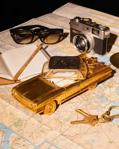 SOLID BRASS IMPALA CIGARETTE HOLDER & LIGHTER