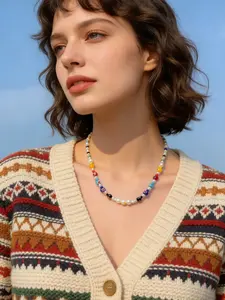 Colorful glass flower beaded necklace, multifunctional faux pearl necklace, minimalist glazed small flower, high-end hip-hop niche clavicle chain, fashion accessory with random bead colors.
