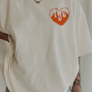 Heart Design T-Shirt with Orange Flame now only available in red Pattern, Casual Style, Short Sleeve, Crew Neck, Regular Fit, Ideal for Daily Wear