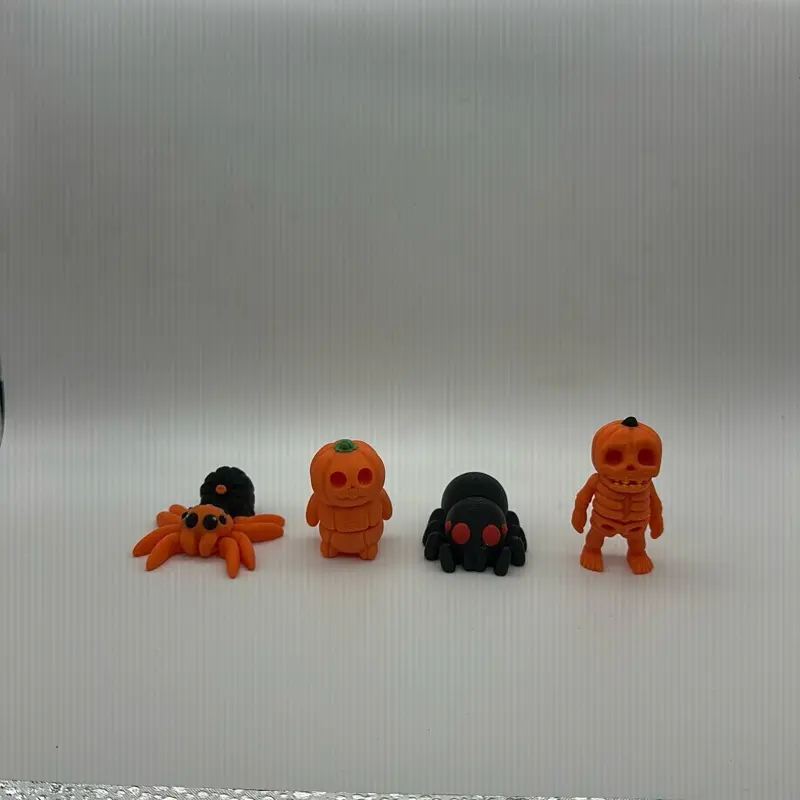Random Pack of Articulated Halloween 3D Printed Fidgets - May Include Spider, Pumpkin, and Skeleton Designs