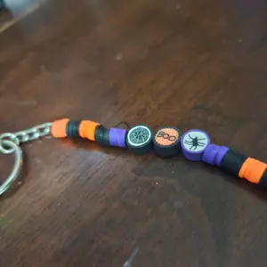 Clay beaded bracelets, keychains, and earrings.