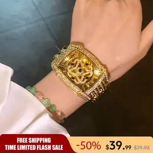 Luxury Diamond Gold Watch for Women  Gold Square Dial with Diamond-Encrusted Rotating Four-Leaf Clover Star Design, Fashionable, Sparkling & Versatile Timeless Classic Design, Includes Adjustment Tool