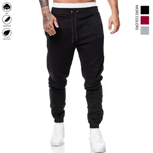 Men's jogging pants with pockets - elastic drawstring waist, flared cuffs, cone-shaped legs. These are casual sports/outdoor pants suitable for gym use and daily wear.