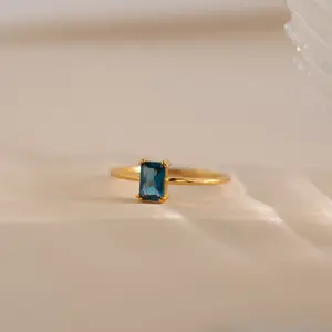 Blue Topaz Emerald Ring by Caitlyn Minimalist - Vintage Emerald Cut Solitaire Ring in Gold - Dainty Blue Birthstone Jewelry - Engagement Gift for Hers
