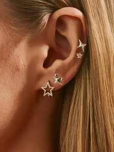 6-piece punk-style star ear stud set, featuring hollowed-out five-pointed stars and starburst designs, a punk-style earring set
