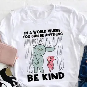 Be Kind In A World Where You Can Be Anything Teacher T-Shirt, Be Kind Shirt, Kindergarten Shirt, Teacher Shirt, Gift For Teacher Golf Gift T-Shirt For Men And Women