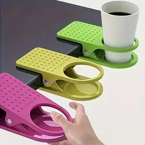 A plastic cup holder - a space saving, sturdy, and lightweight desktop beverage holder suitable for homes, offices, and restaurants