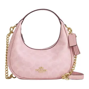 COACH Carmen 20 Canvas and Leather Crossbody Bag with Detachable Strap for Women in Pink