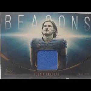 Panini 2024 Luminance Beacons Relics Justin Herbert #BEA-JHT Gold /50 MEM Football Card with Blue Jersey Patch