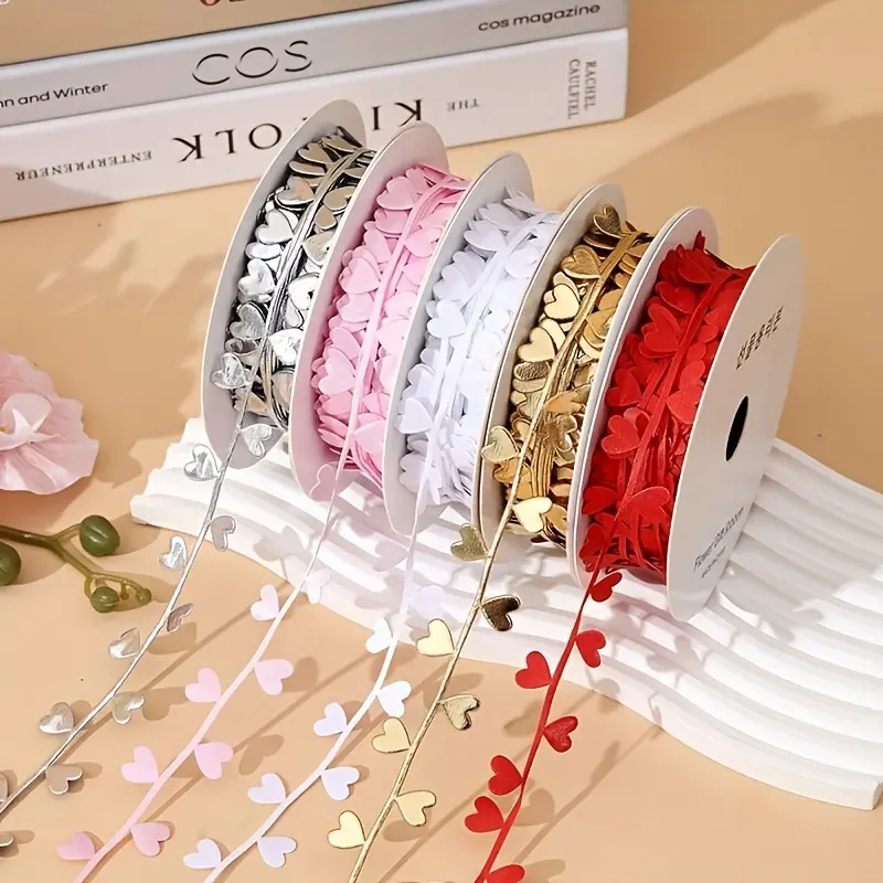 A heart-shaped ribbon, with a length of 2 yards and a width of 2.5 cm, is available in white, red, pink, gold and silver, suitable for wrapping flowers and gifts and being used for decoration in holiday crafts.